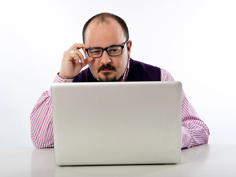 man working on laptop