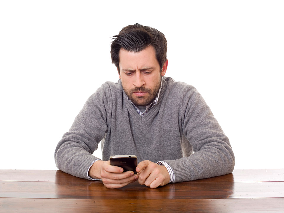 man on his phone working